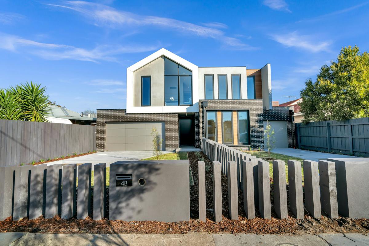 3D architectural visualization of a modern gabled house
