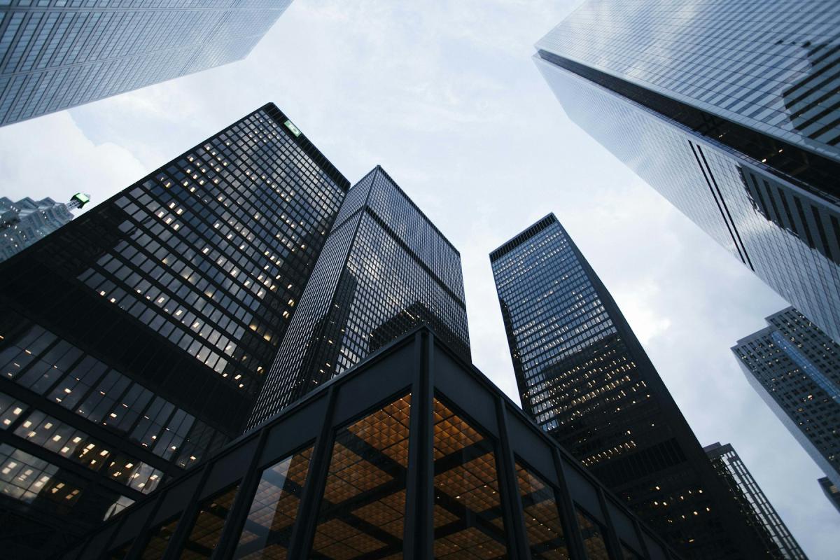 Commercial Interior — Glass commercial building design rising towards the sky