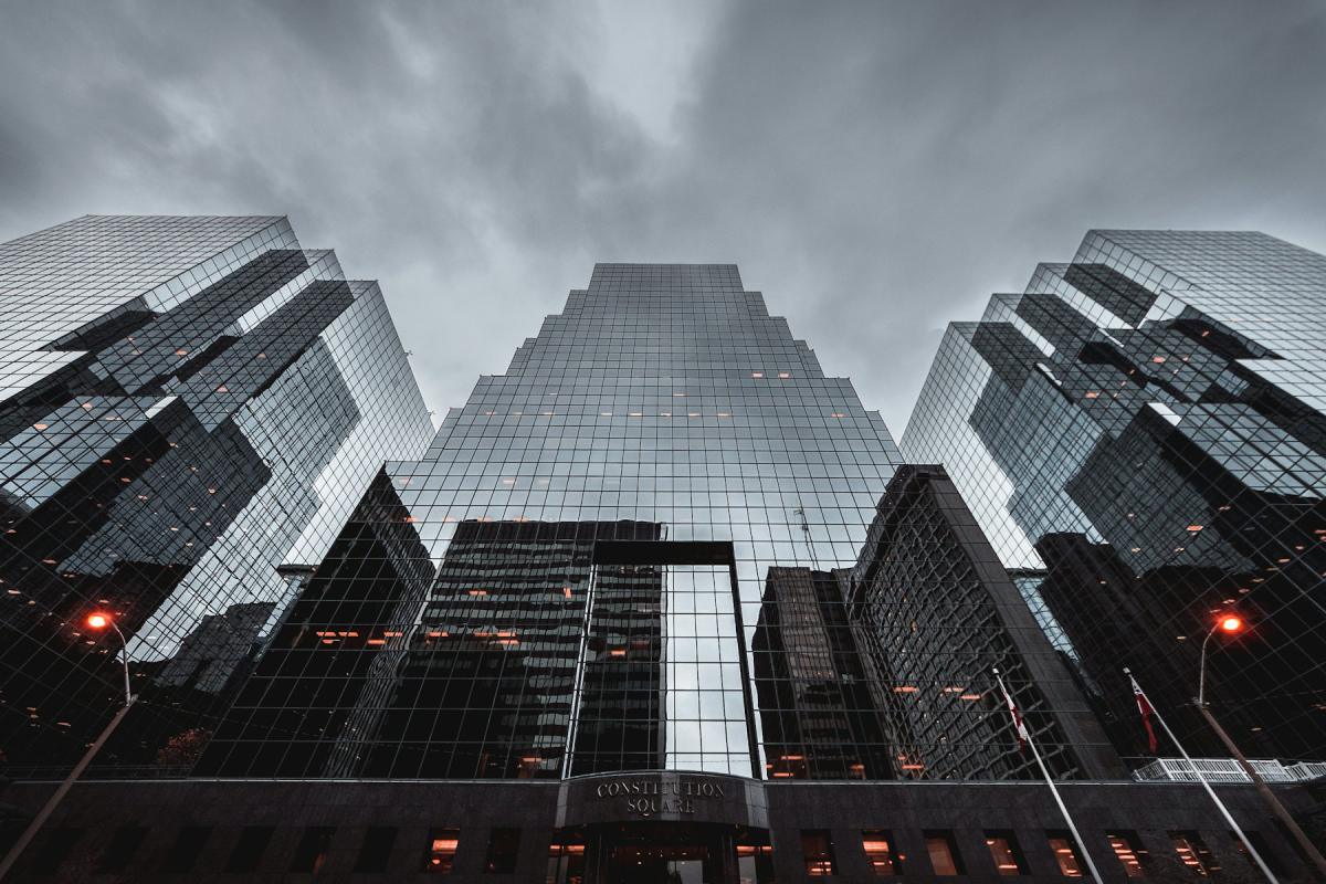 High-rise architecture viewed from below in monochrome