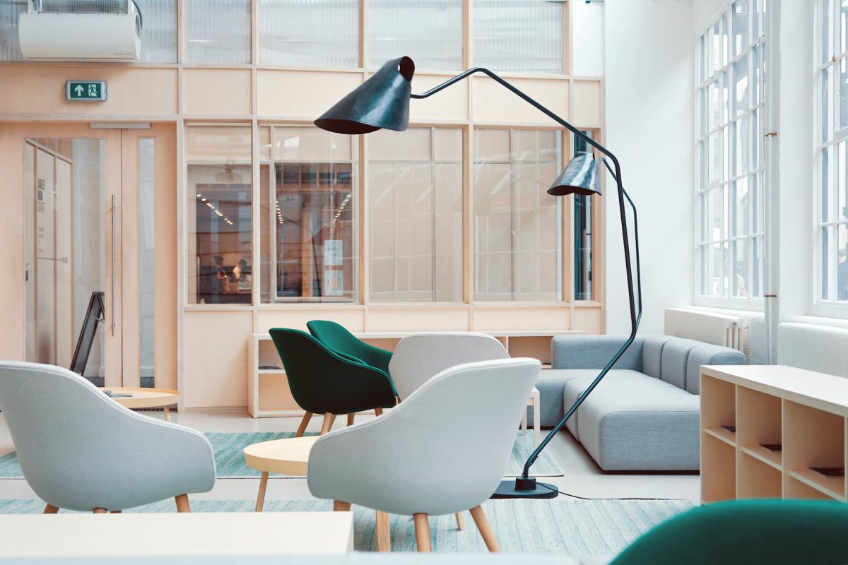 Collaborative office interior with lounge seating and task lighting Collaborative office interior with lounge seating and task lighting