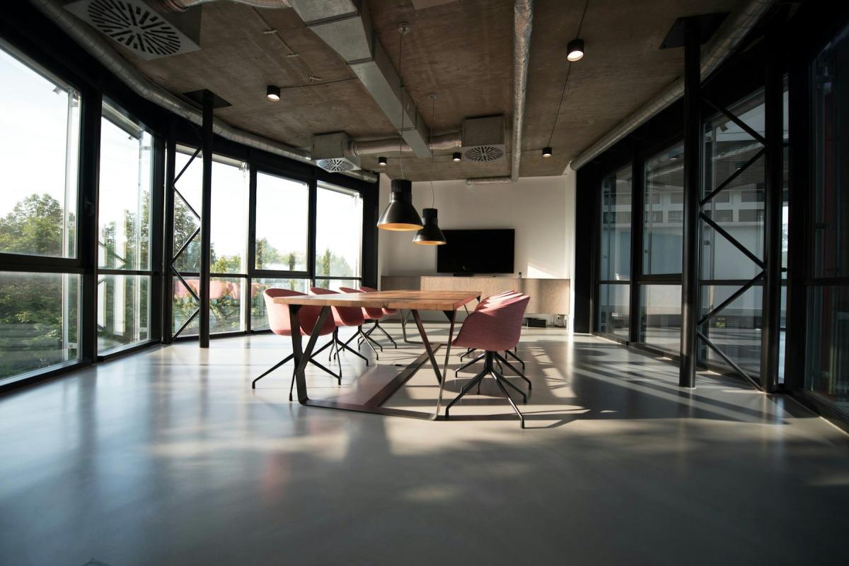 Modern Office — Modern office interior with exposed ceiling and open workstations Modern Office — Modern office interior with exposed ceiling and open workstations