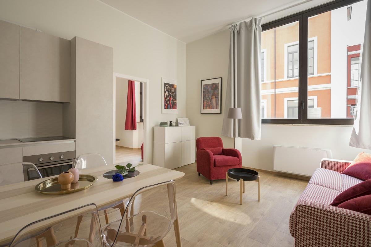 Bright apartment interior design with open living and dining area Bright apartment interior design with open living and dining area