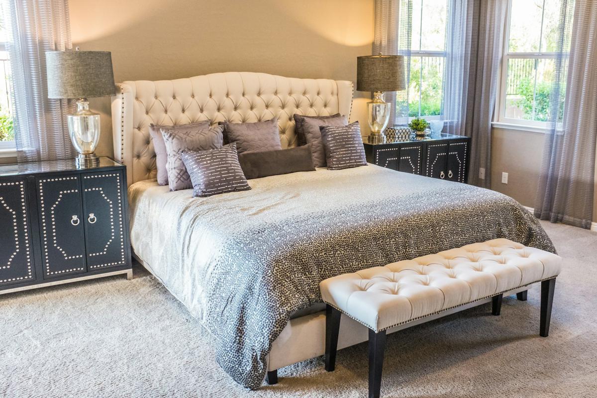 Luxury bedroom design with tufted headboard and classic detailing Luxury bedroom design with tufted headboard and classic detailing